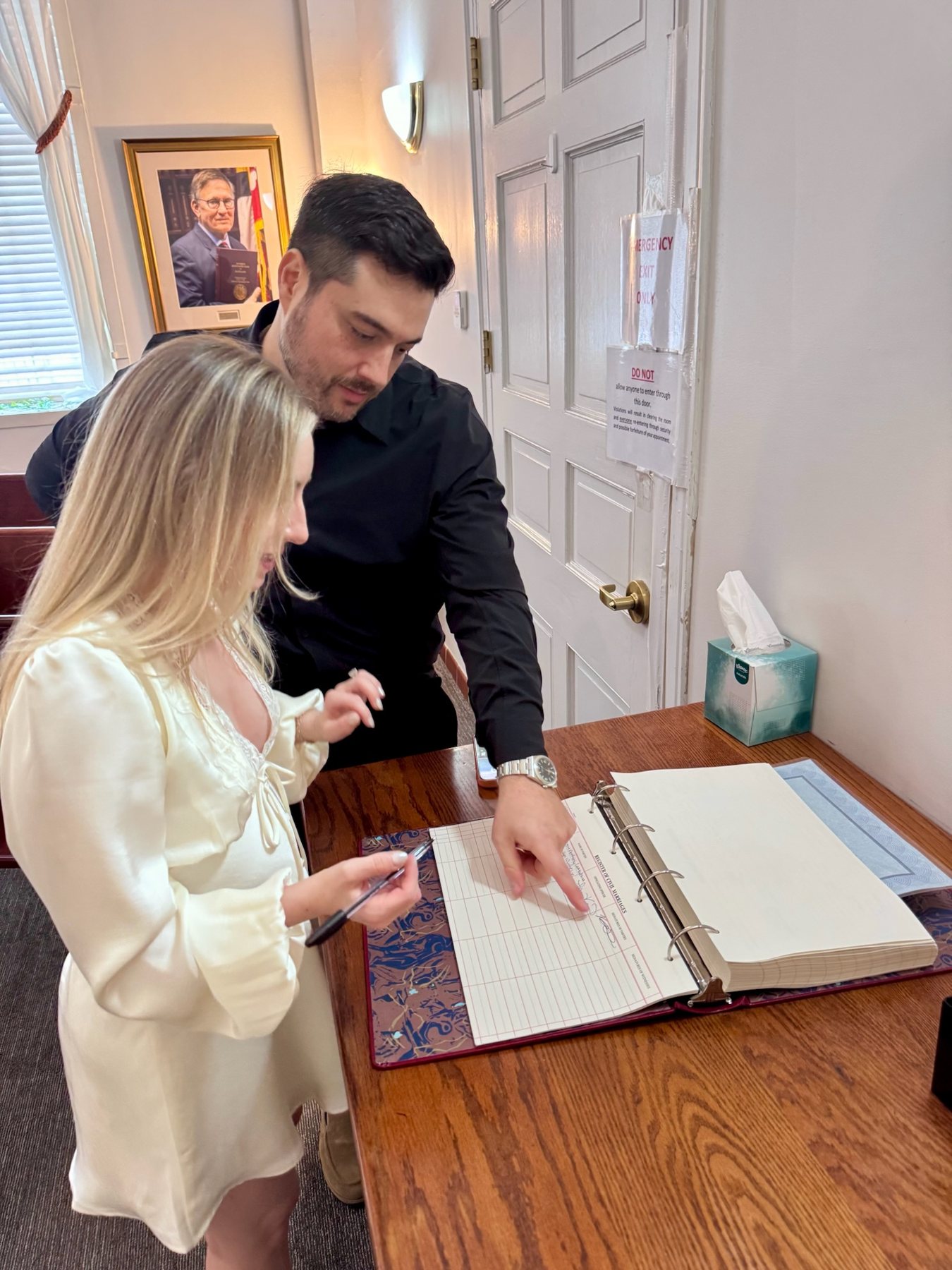 Signing the register of civil marriages