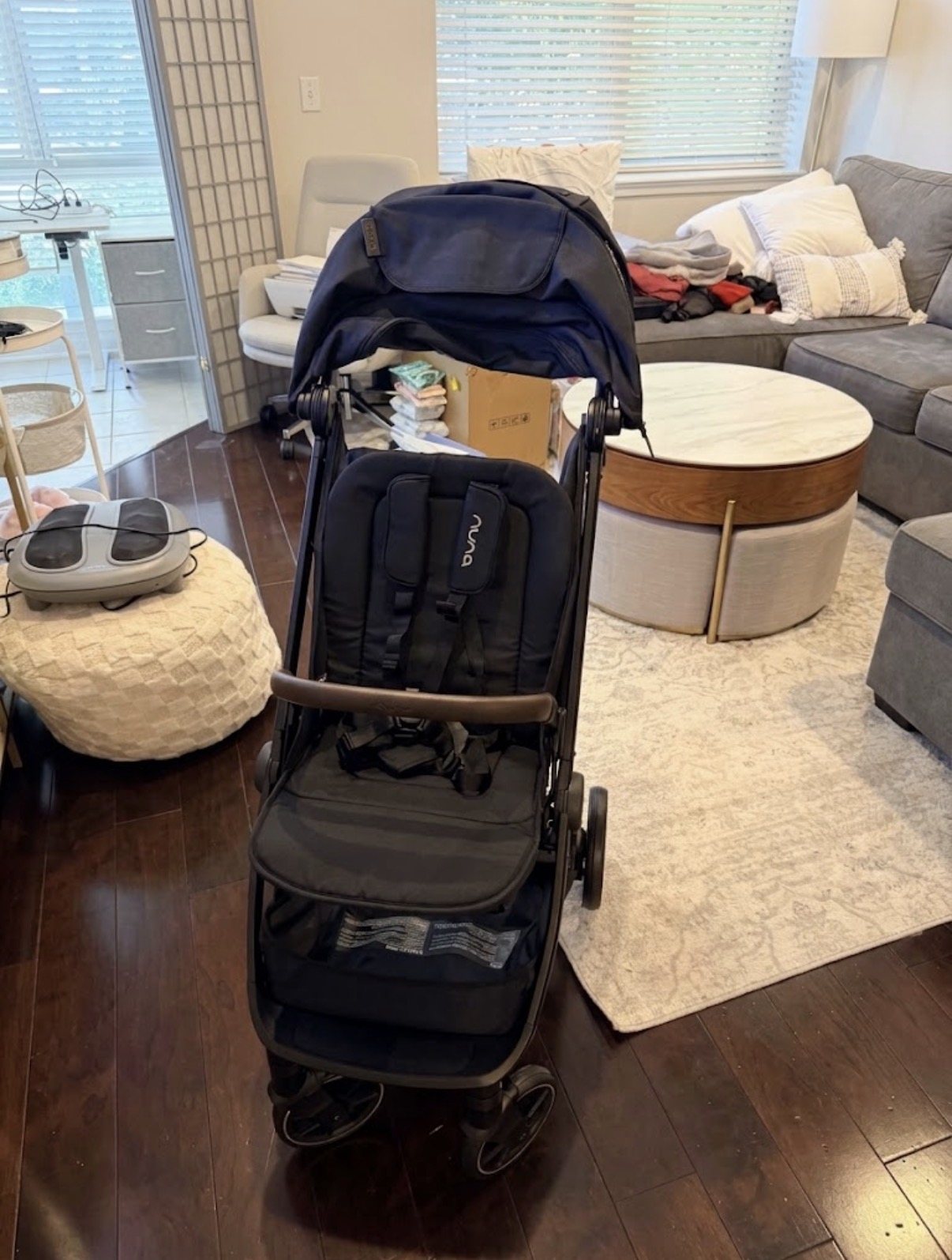 Ellie's new stroller set up in the living room